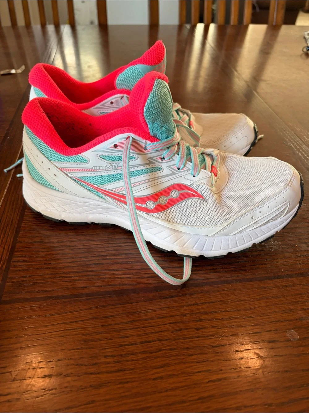 Saucony White Running Shoes with Pink & Teal Details